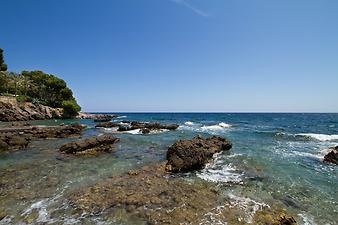 a b: Stand Cala Sa Marjal