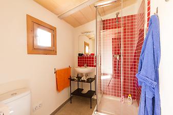 Finca Son Vives: Bad ensuite mit mallorquinischen Flusskieseln